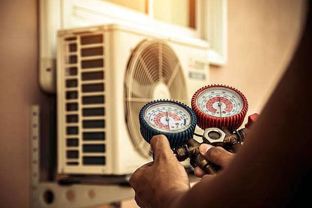 Professional Heat Pump Repair technician working in Fremont, NH